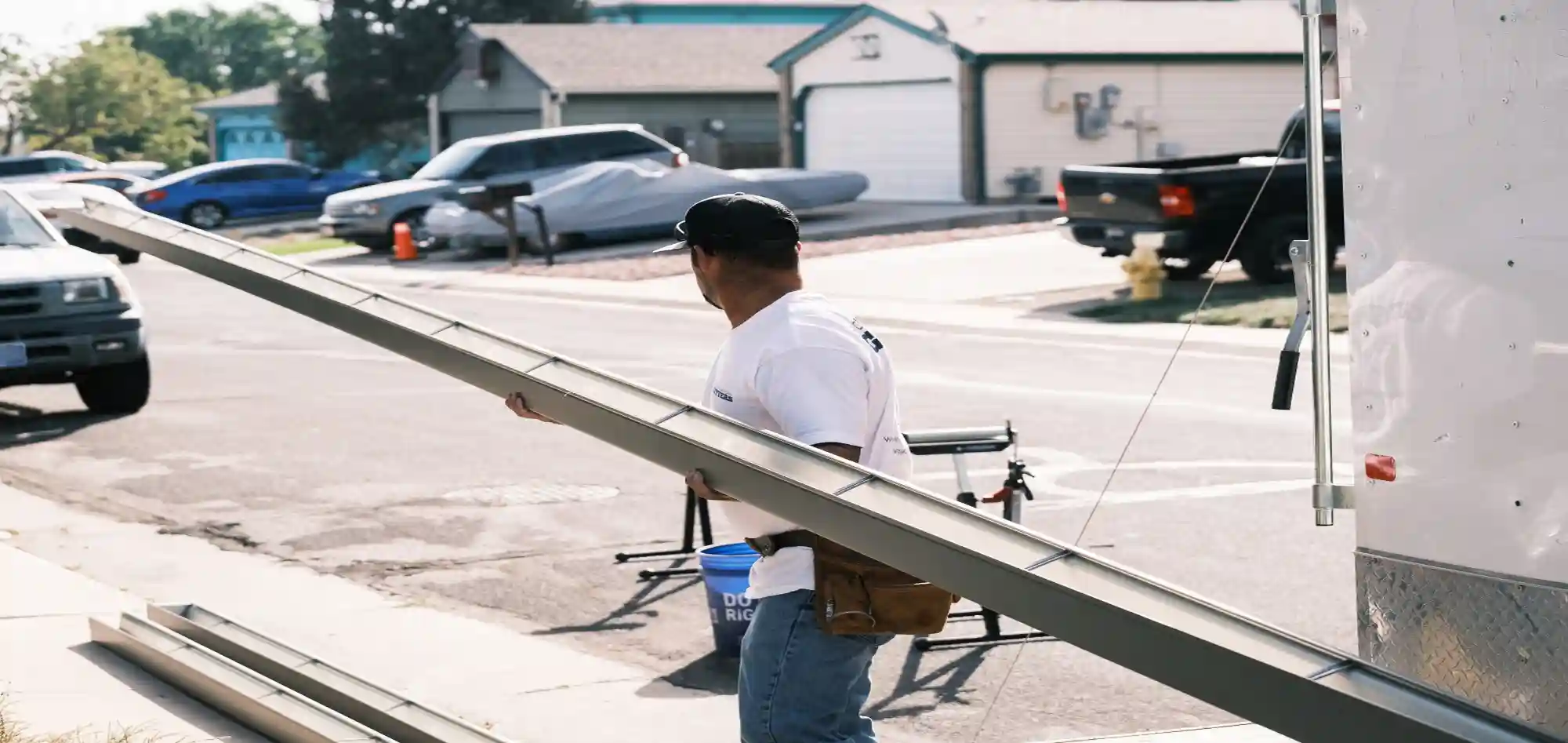 Crew carrying gutter section