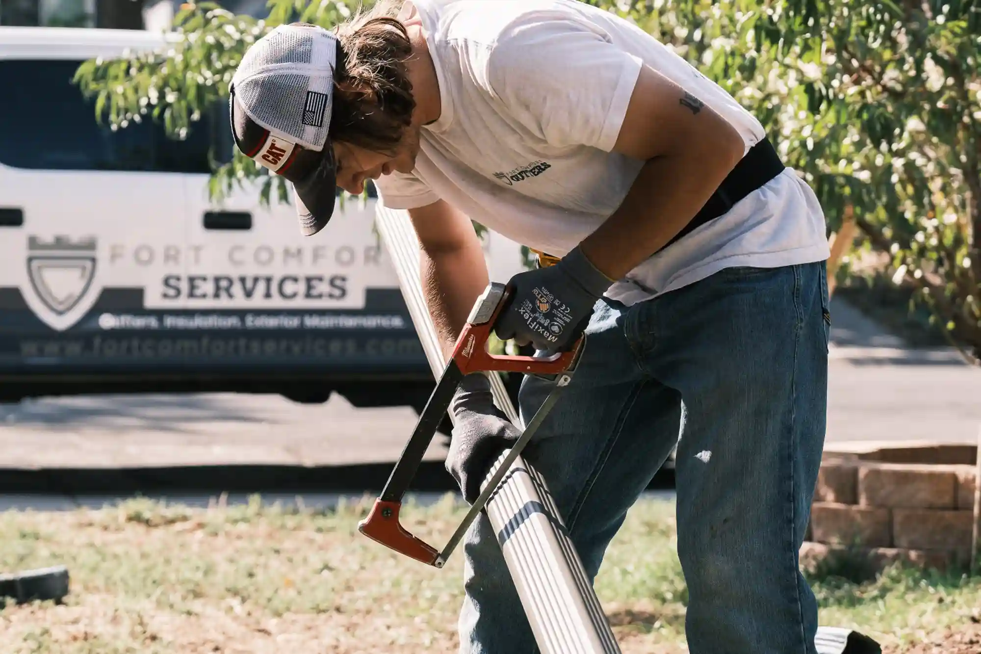 Fort Comfort crew fabricating gutters on-site