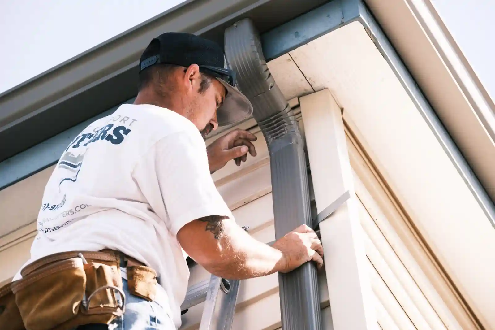Gutter repair on a Denver area home